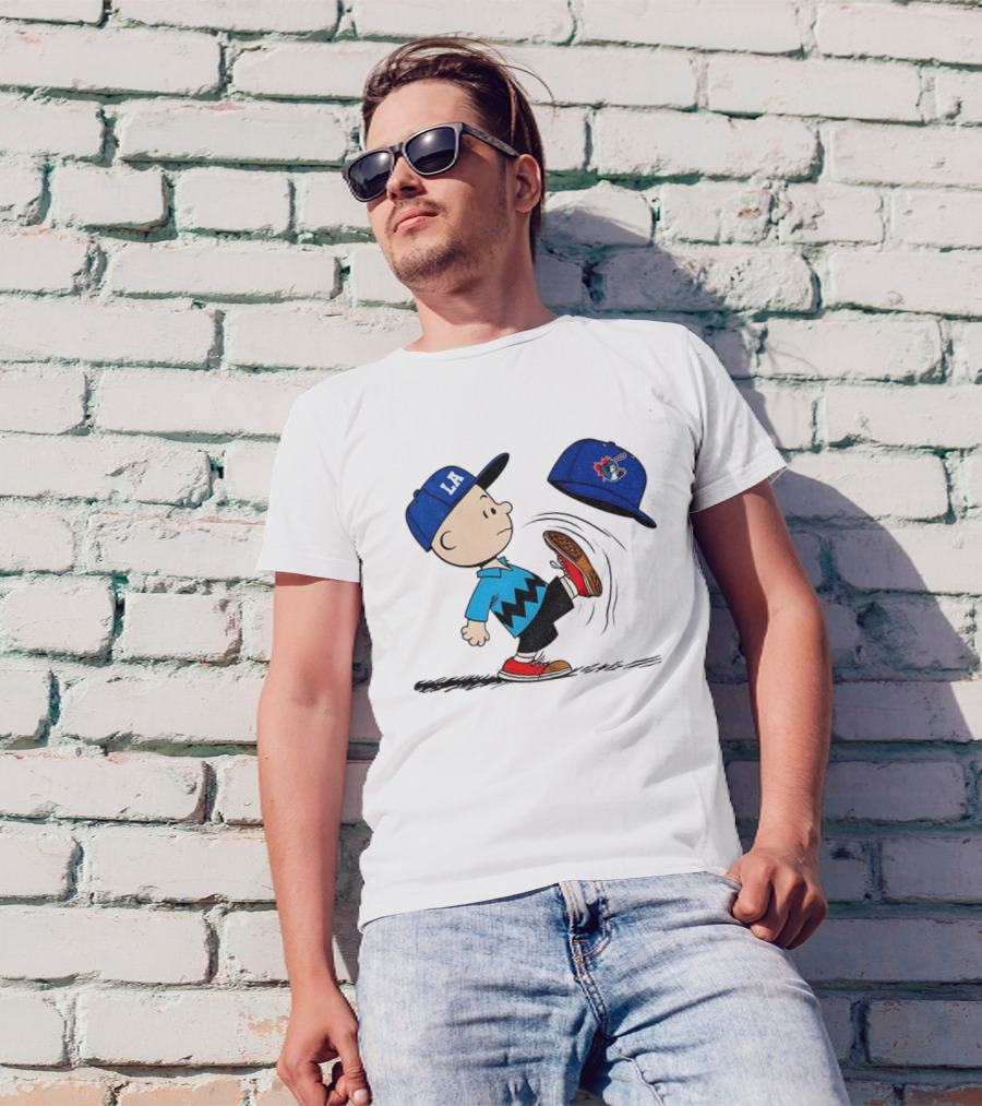 Los Angeles Dodgers LA Cap Charlie Brown Kicking Toronto Blue Jays Hat Peanuts Crossover T-Shirt