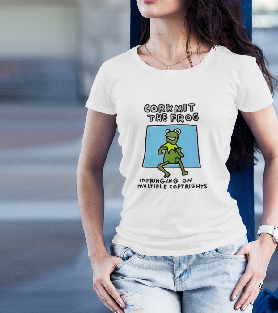 Corkmit The Frog Infringing On Multiple Copyrights Green Frog Cartoon With Blue Background T-Shirt