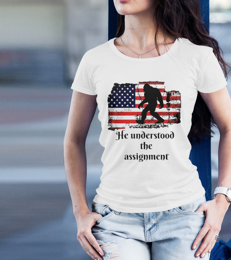 Bigfoot Silhouette With Distressed American Flag He Understood The Assignment T-Shirt