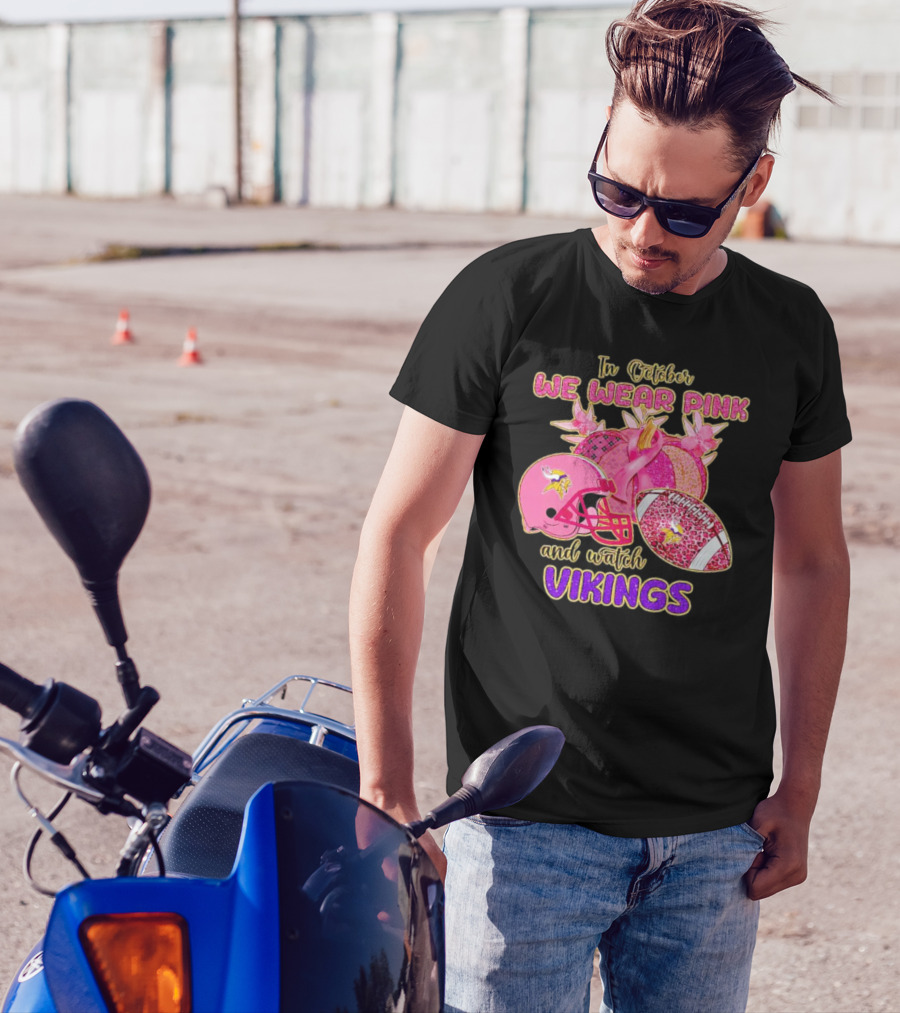 In October We Wear Pink And Watch Vikings Football Helmets Breast Cancer Awareness T-Shirt