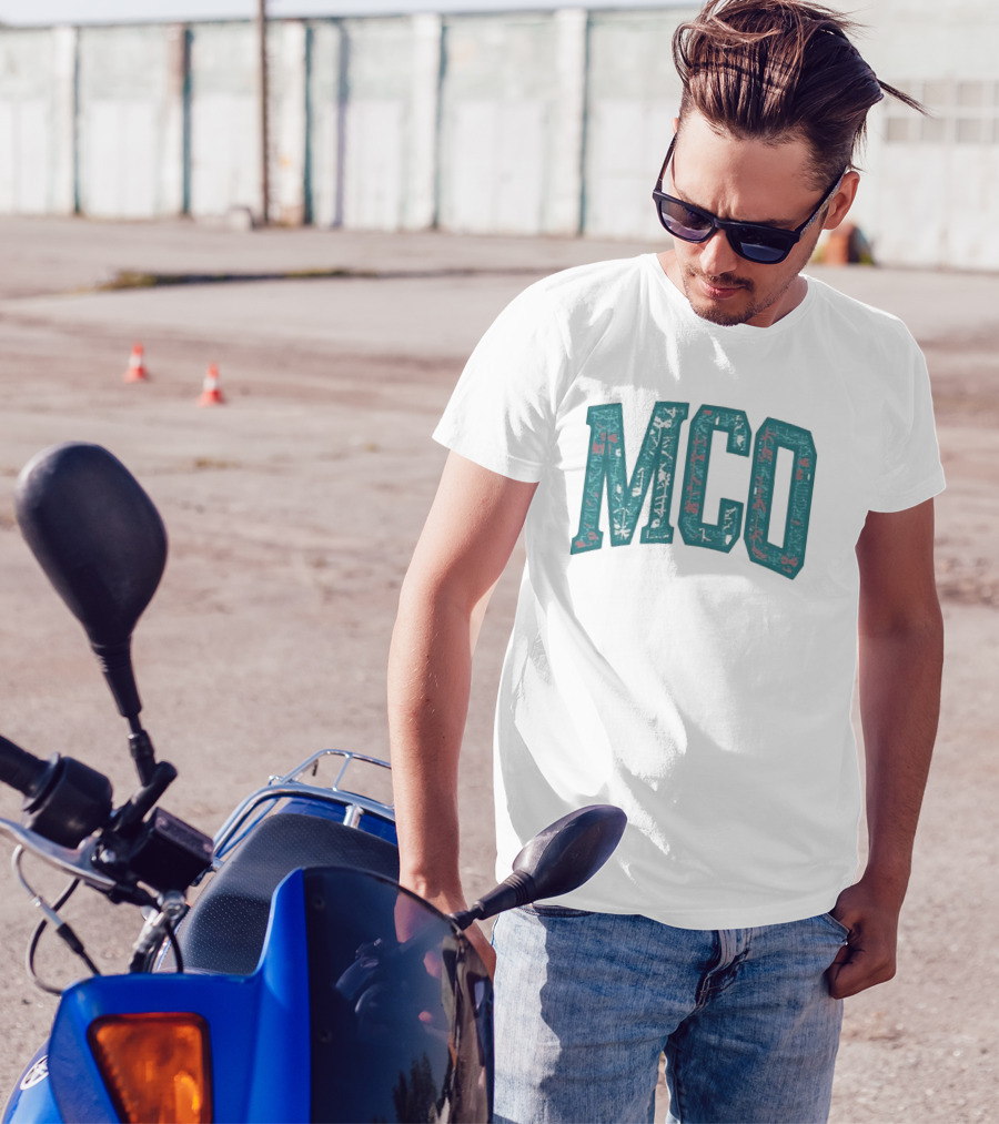 MCO Magic Carpet Oasis Vintage Teal Textured Letters T-Shirt